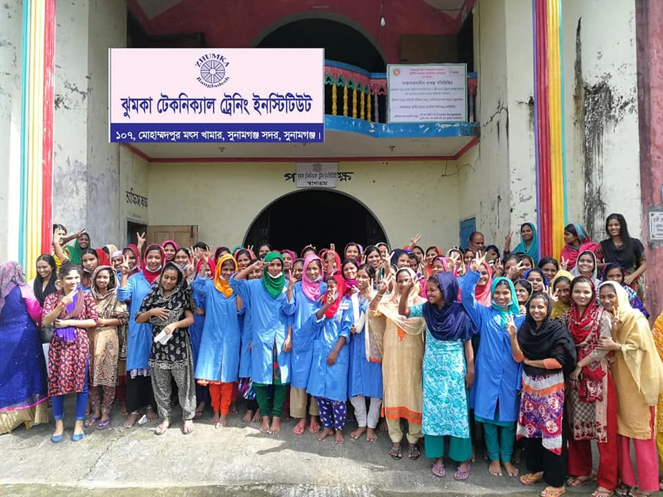 The team outside the Zhumka Technical Training Institute building in Sunamganj