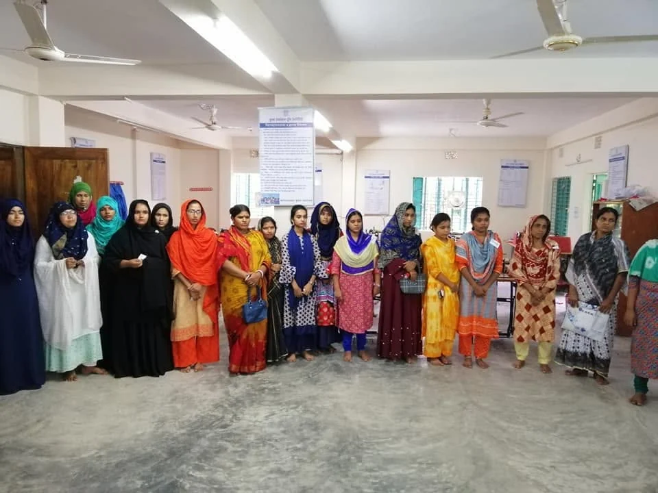 Trainees standing together inside the training hall